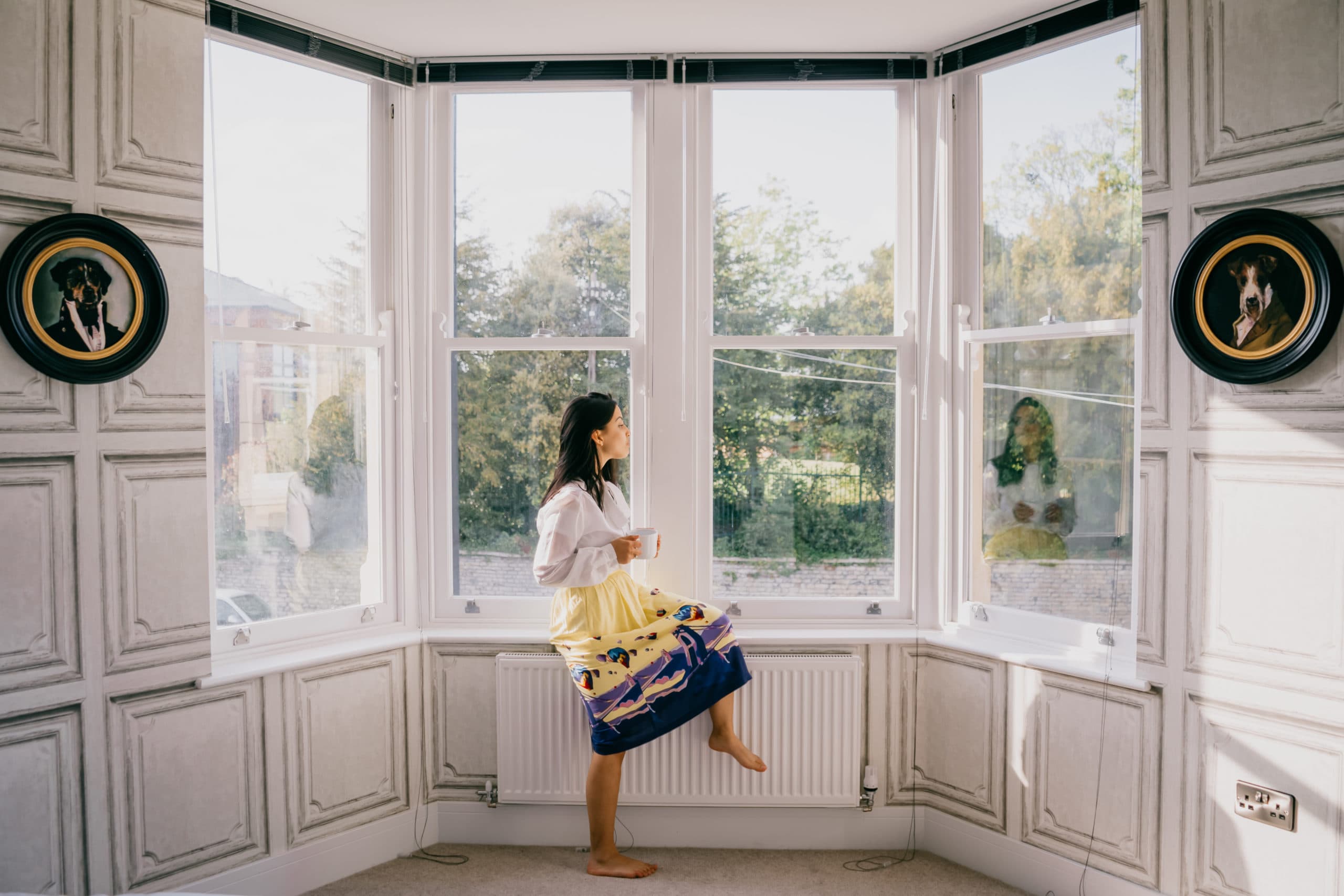 woman looking out of window